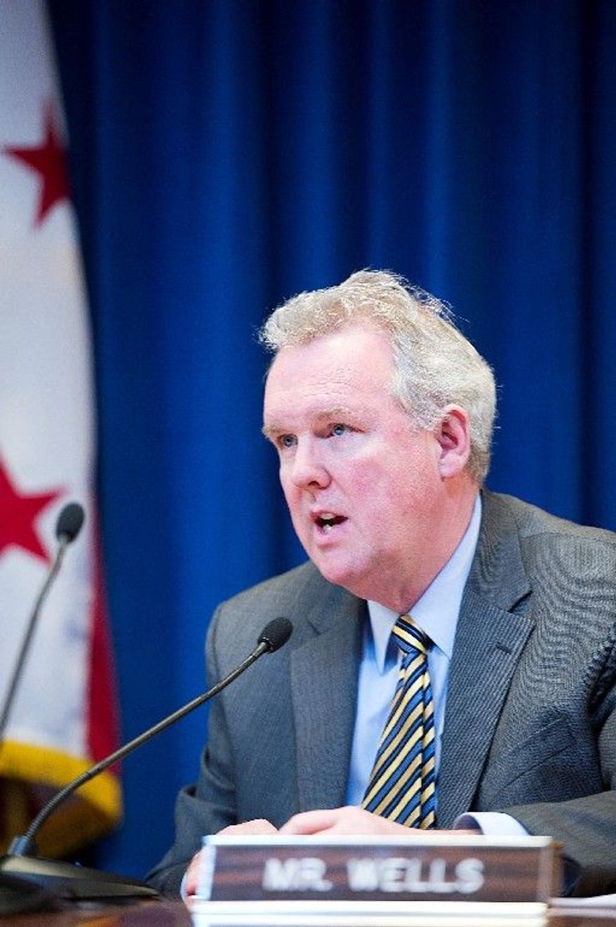 **FILE** D.C. Council member Tommy Wells (Barbara L. Salisbury/The Washington Times)