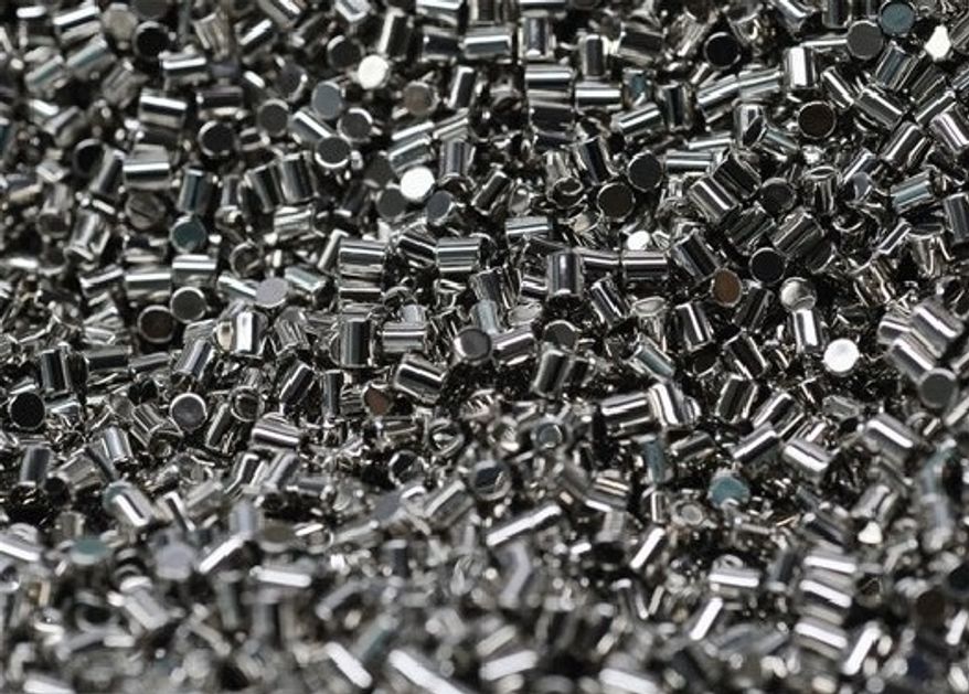 **FILE** In this undated photo, chunks of chemically processed rare earths are shown in Beijing. (Associated Press/Kyodo News)