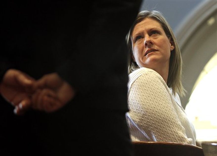 Kristen LaBrie talks to a court officer during a recess after she was found guilty on all four counts including attempted murder, in the death of her son, at Lawrence Superior Court in Lawrence, Ma, Tuesday, April 12, 2011. LaBrie was also convicted of child endangerment and assault and battery for failing to give her son, Jeremy Fraser, chemotherapy medications after the boy was diagnosed with non-Hodgkins lymphoma. He died in 2009 at age 9. (AP Photo/Cheryl Senter)