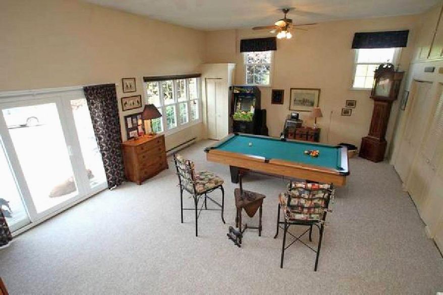 The family room is large enough to accommodate the owner's billiards table and still have plenty of room left over.