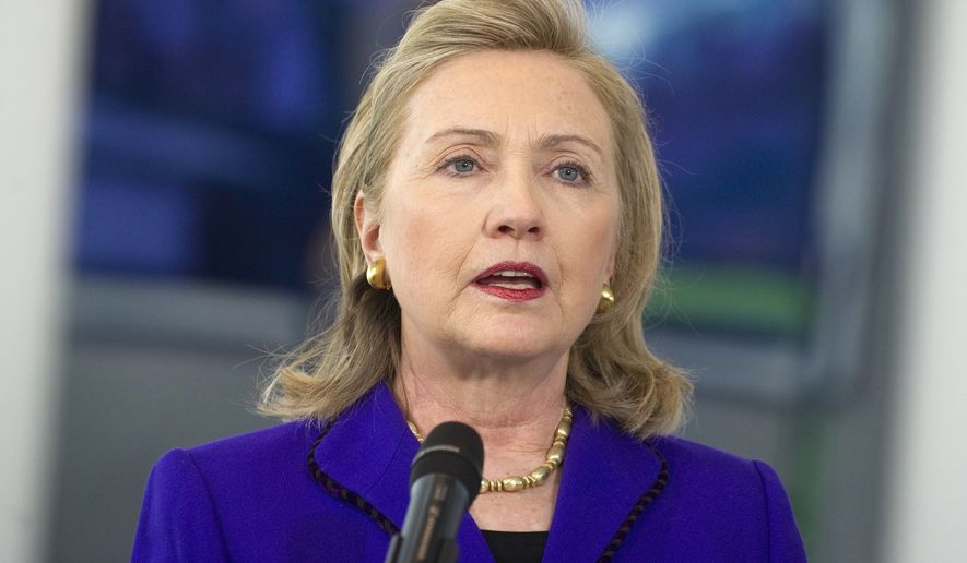 Secretary of State Hillary Rodham Clinton speaks to the media before meeting with German Chancellor Angela Merkel at the Chancellery in Berlin on Thursday, April 14, 2011. Mrs. Clinton is in Berlin to attend a two-day meeting of NATO foreign ministers. (AP Photo/Saul Loeb, Pool)