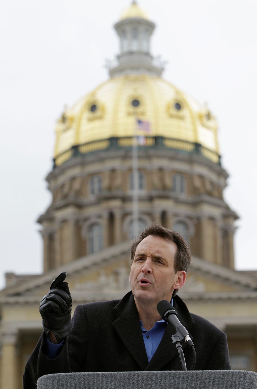 Associated Press
Former Minnesota Gov. Tim Pawlenty speaks at a tea party rally Saturday at the Statehouse in Des Moines, Iowa. "I think one of our basic messages is, the government's too damn big," the Republican presidential hopeful said.