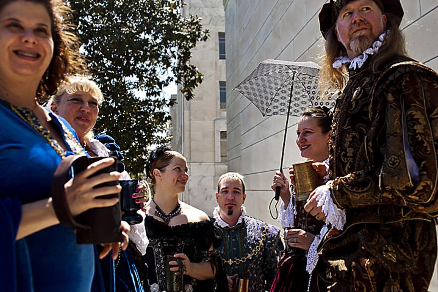 Members of the group "The Party That Never Ends" came to the open house open house for Shakespeare's Birthday dressed in Renaissance era clothing at the Folger Shakespeare Library, in Washington, D.C., Sunday, April 17, 2011. The group dresses up and travels around to various festivals around the country. (Drew Angerer/The Washington Times)