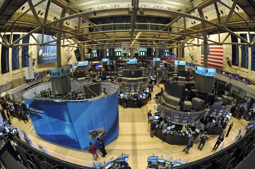 A trading post undergoes modernization on the floor of the New York Stock Exchange on Monday, April 18, 2011. Stocks are sharply lower after Standard & Poor's issued a warning on U.S. government debt. Fears about Europe's debt problems are also pushing markets lower. (AP Photo/Henny Ray Abrams)