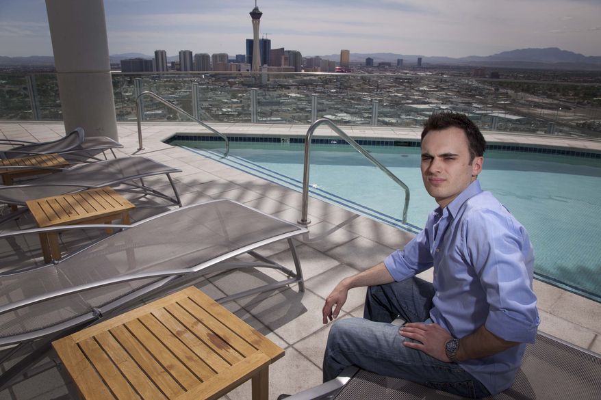 Professional online poker player Robert Fellner is seen on the roof of his Las Vegas apartment building Tuesday. Fellner, who left his job at a New Jersey dry cleaners four years ago to move to play online poker professionally, has seen his bankroll grow to $280,000. But since the government essentially shut down the poker industry with a prosecution against executives of the main companies, Fellner and others like him worry they'll never see their money again. (Associated Press)