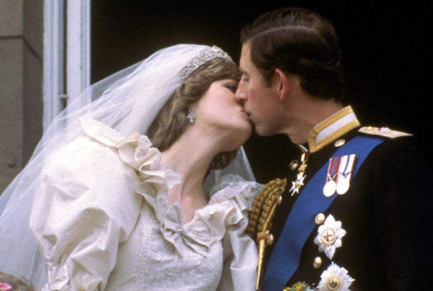 In this July 29, 1981 photo, Princess Diana and Prince Charles kiss on the balcony of Buckingham Palace on their wedding day, in London, England. (Photo: Associated Press)