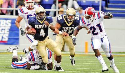 Quarterback Ricky Dobbs (4) finished his Navy career as the school&#39;s all-time leader in touchdowns (49) and fifth in rushing yardage (2,665). (The Washington Times)