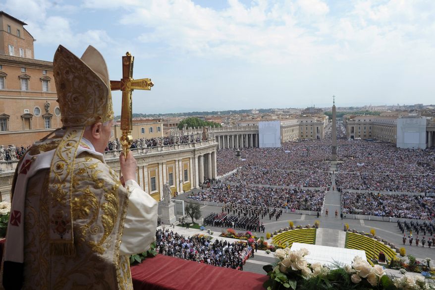 In this photo provided by the Vatican newspaper L'Osservatore Romano, Pope Benedict XVI holds his pastoral staff Sunday during the "Urbi et Orbi" (Latin for to the City and to the World) message from the balcony of St. Peter's Basilica at the end of the Easter Mass in St. Peter's Square at the Vatican. Benedict XVI urged an end to fighting in Libya, using his Easter Sunday message to call for diplomacy and peace in the Middle East. (Associated Press/L'Osservatore Romano)