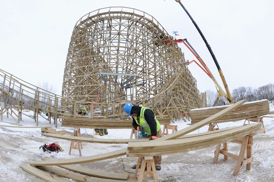 ASSOCIATED PRESS
Dan Carpenter works to get on track for a replica of the Zippin Pippin, Elvis Presley's favorite roller coaster, at Bay Beach Amusement Park in Green Bay, Wis. Mayoral candidate Patrick Evans complained early and often about the $3.5 million cost, but his campaign "got swept up in the tidal wave" of the collective bargaining fight in Madison.