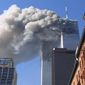 On Sept. 11, 2001, the twin towers of the World Trade Center burn and later collapse after hijacked planes deliberately crashed into them in New York City. A multimillion-dollar reward was offered for now-dead terrorist Osama bin Laden after the attacks.