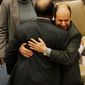 ASSOCIATED PRESS PHOTOGRAPHS
Deputy U.N. Ambassador Ibrahim Dabbashi (right) hugs Libya&#39;s U.N. Ambassador Mohamed Shalgham after a meeting of the Security Council at United Nations headquarters in February. Tension was high at the time after fighting broke out between pro- and anti-Gadhafi forces. 