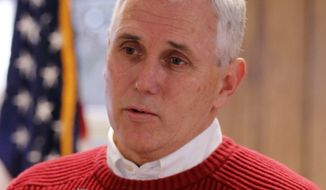 **FILE** Rep. Mike Pence, Indiana Republican, meets Jan. 28 with constituents in Pendleton, Ind. Pence is planning a private conference call with supporters this week, fueling speculation that he will make an announcement soon on whether he&#39;ll run for Indiana governor in 2012. (Associated Press)