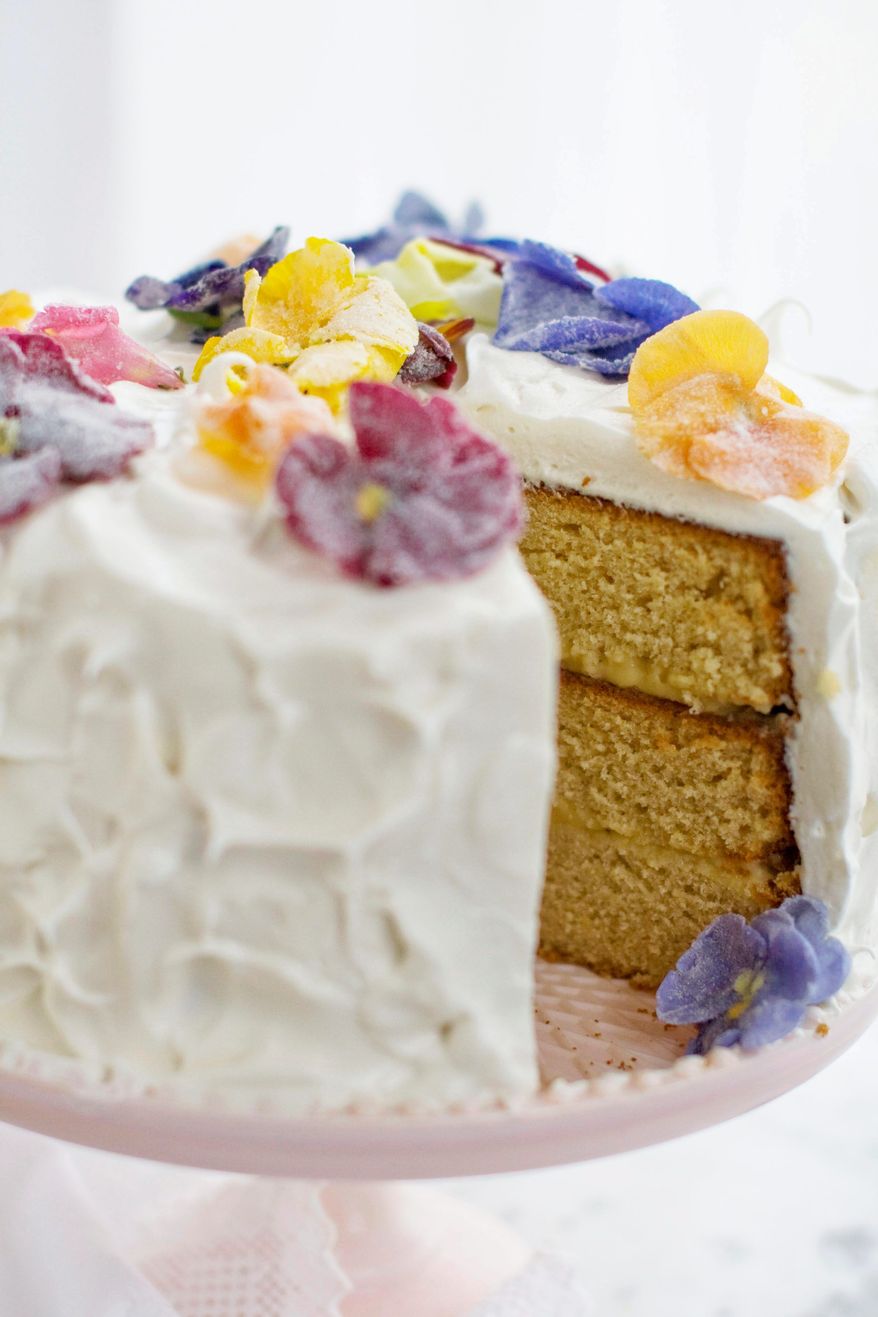 ASSOCIATED PRESS
A lemon-honey triple-layer cake decorated with edible sugared flowers is a delightful variation on the traditional bouquet for mom on Mother's Day.