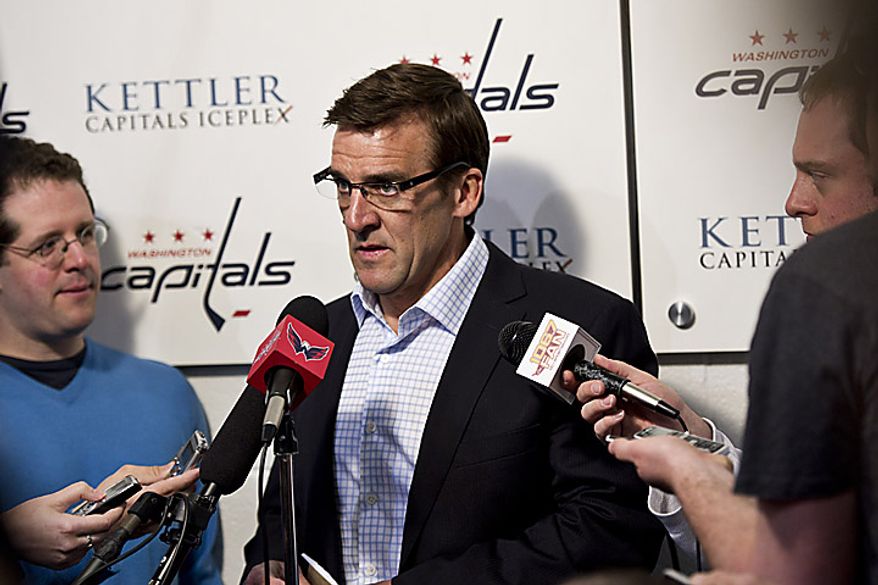 Capitals general manager George McPhee talks with the media at the Kettler Ice Complex in Arlington, Va., on May 5, 2011. (Drew Angerer/The Washington Times)
