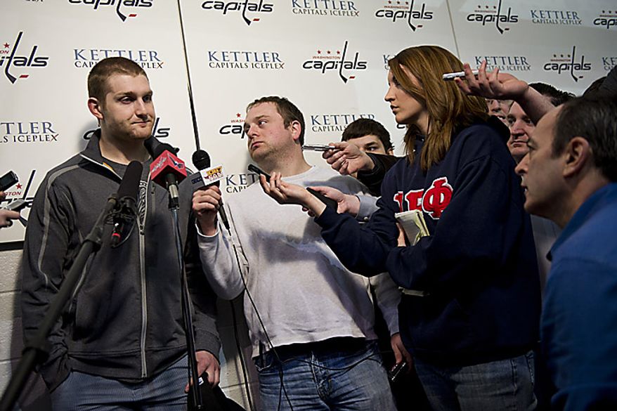 Capitals player Carl Alzner talks with the media at the Kettler Ice Complex in Arlington on Thursday, May 5, 2011. (Drew Angerer/The Washington Times)