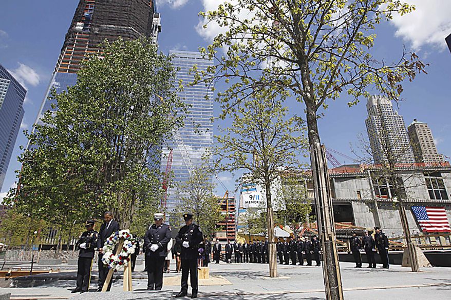 President Barack Obama pauses after laying a wreath at the National Sept. 11 Memorial at Ground Zero in New York, Thursday, May 5, 2011. (AP Photo/Charles Dharapak)
