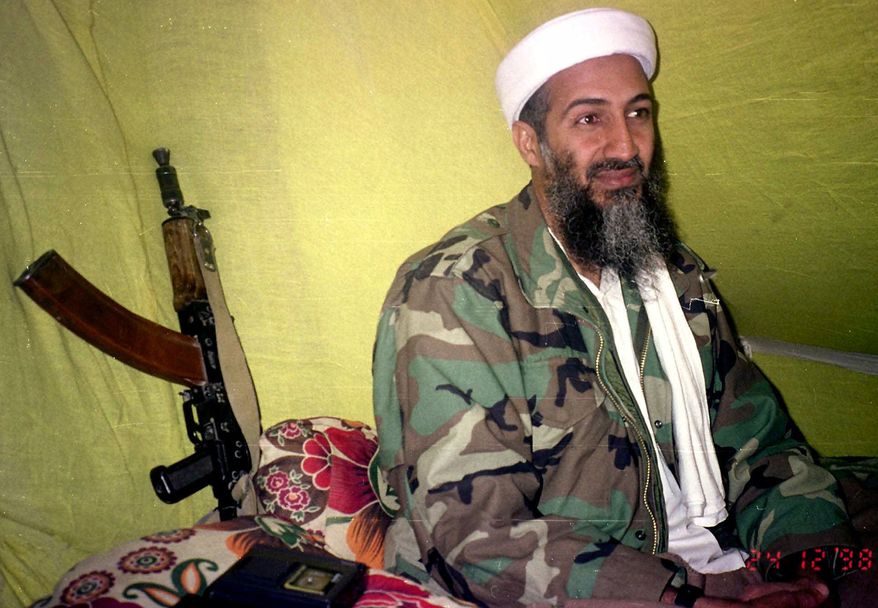 ** FILE ** In this Dec. 24, 1998, file photo, Muslim militant and al Qaeda leader Osama Bin Laden speaks to a selected group of reporters in mountains of Helmand province in southern Afghanistan. (AP Photo/Rahimullah Yousafzai, File)


