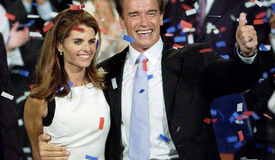 ** FILE ** Arnold Schwarzenegger and wife Maria Shriver celebrate his victory in the California gubernatorial recall election in Los Angeles on Oct. 7, 2003. (AP Photo)