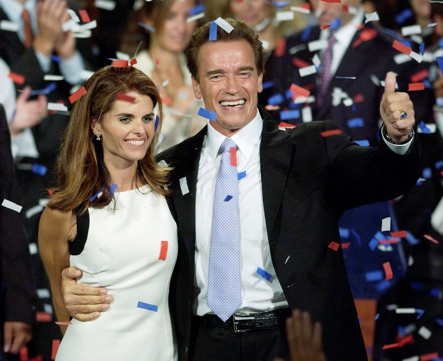 ** FILE ** Arnold Schwarzenegger and wife Maria Shriver celebrate his victory in the California gubernatorial recall election in Los Angeles on Oct. 7, 2003. (AP Photo)