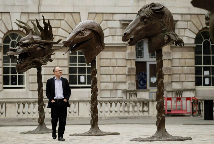 The unveiling Wednesday of 12 bronze animal heads by Chinese artist Ai Weiwei in the courtyard of London's Somerset House is part of a global reaction to the artist's arrest. The heads represent the Chinese zodiac. (Associated Press)