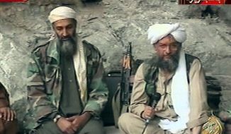 **FILE** In this photo from Oct. 7, 2001, Osama bin Laden (left) and his top lieutenant Egyptian Ayman al-Zawahri are seen at an undisclosed location in this television image broadcast. (Associated Press/Al Jazeera)