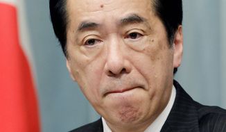 Japanese Prime Minister Naoto Kan has started winning public support while trying to guide the nation through its post-tsunami crisis. (Associated Press)