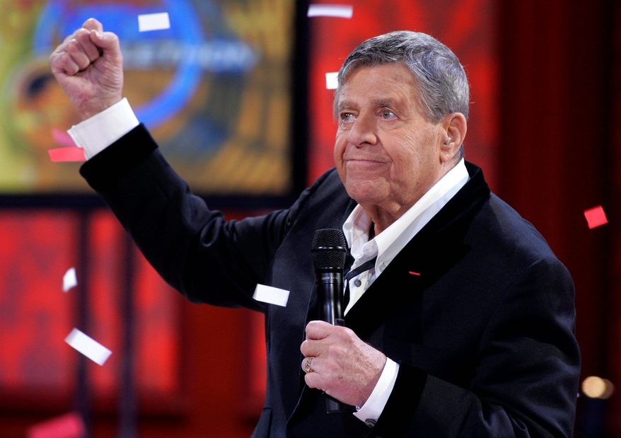Jerry Lewis reacts to the final donations tally at the 2008 Labor Day muscular dystrophy telethon. This year's telethon will be his last as host. (Associated Press)
