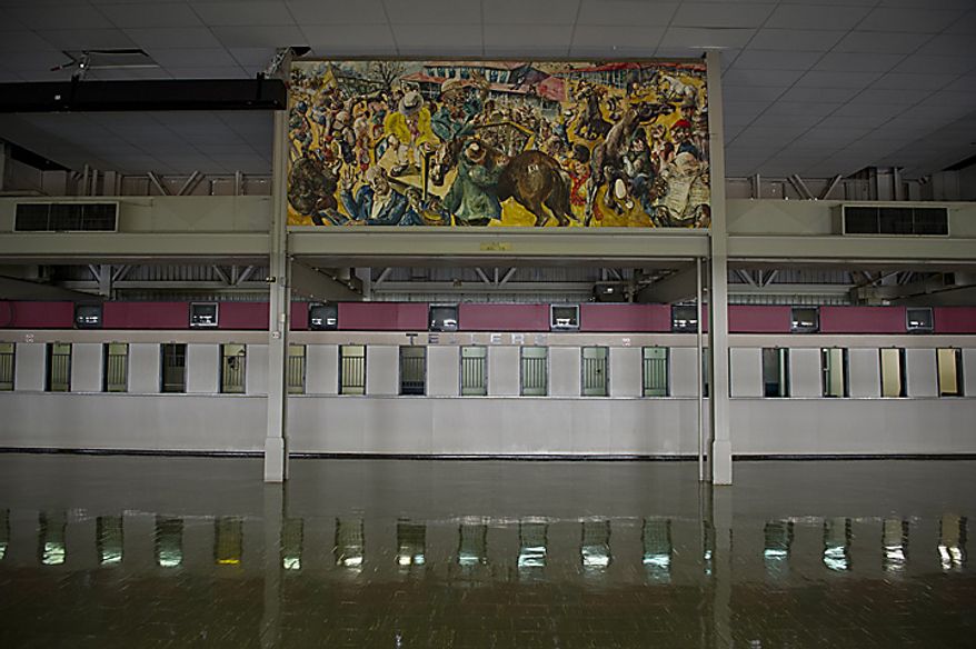 Teller windows are closed and the grounds are empty with no races on this day, five days before the 136th running of the Preakness Stakes, the grounds at the Pimlico Race Course are still in need of repair in Baltimore, Md., Monday, May 16, 2011. (Rod Lamkey Jr./The Washington Times)