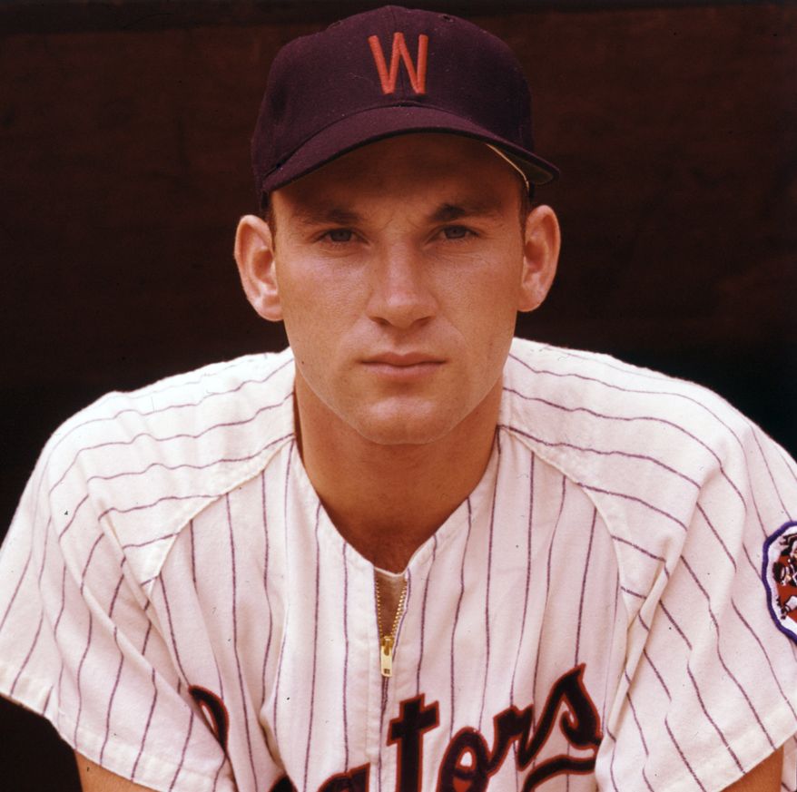 In this August 1959 file photo, Washington Senators outfielder Harmon Killebrew poses for a portrait. Killebrew, the affable, big-swinging Hall of Famer whose tape-measure home runs made him the cornerstone of the Minnesota Twins, died Tuesday, May 17, 2011 at his home in Scottsdale, Ariz., after battling esophageal cancer. He was 74. Killebrew broke in to the majors with the Senators in 1954 as an 18-year-old. (AP Photo/File)