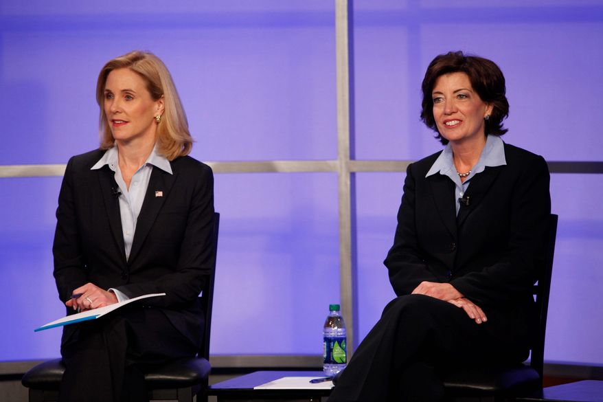 The major-party candidates for New York&#39;s 26th Congressional District, Republican Jane Corwin (left) and Democrat Kathy Hochul, participate in a debate May 12. They and an independent are vying in a special election Tuesday.
