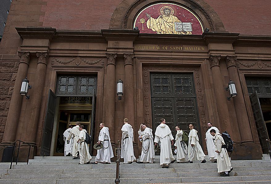 Friars from the Dominican order walk into the Cathedral of St. Matthew the Apostle in downtown Washington on Tuesday, May 24, 2011. The stop was part of their pilgrimage from the Dominican House of Studies in Northeast Washington to St. Dominic's Parish in Southwest to commemorate the date that St. Dominic's body was moved from its original grave to its current resting place in Bologna, Italy. At St. Matthew's the friars held a short prayer service. (Barbara L. Salisbury/The Washington Times)