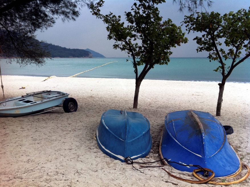 After arriving at Pui O Bay via ferry, visitors can take in the clear water and fine sand before setting off on designated hiking trails for further exploration of Lantau Island, which includes a large monastery, a fishing village and a cable car to the Big Buddha.