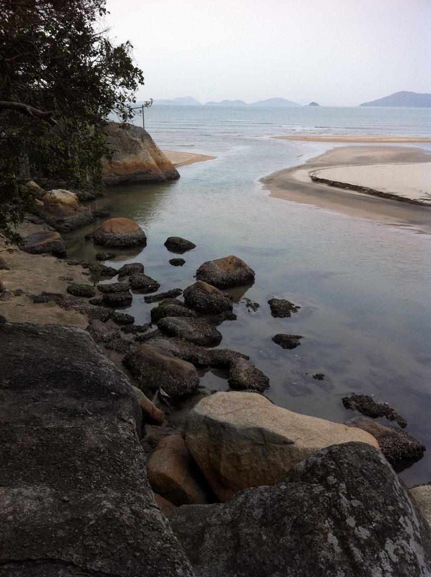 ASSOCIATED PRESS PHOTOGRAPHS
After arriving at Pui O Bay via ferry, visitors can take in the clear water and fine sand before setting off on designated hiking trails for further exploration of Lantau Island, which includes a large monastery, a fishing village and a cable car to the Big Buddha.