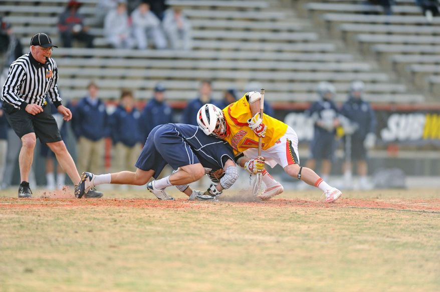 MARYLAND ATHLETICS
Maryland's Curtis Holmes (right) has won at least 50 percent of his faceoffs in every game. He 26-for-36 in the NCAA tournament