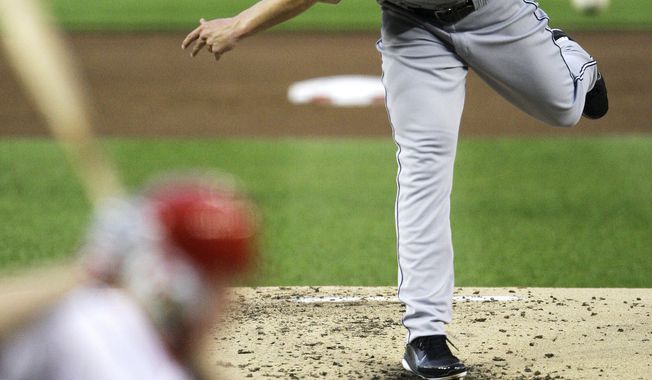 San Diego Padres starting pitcher Clayton Richard throws against the Washington Nationals during the third inning of a baseball game, Friday, May 27, 2011, at Nationals Park in Washington. (AP Photo/Jacquelyn Martin)