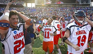 Pat Harbeson (11) of the Virginia Cavaliers celebrates the Cavaliers&#39; 9-7 victory over the Maryland Terrapins for the 2011 NCAA Lacrosse Championship at M&amp;T Bank Stadium in Baltimore on Monday, May 30, 2011. (Rod Lamkey Jr./The Washington Times)