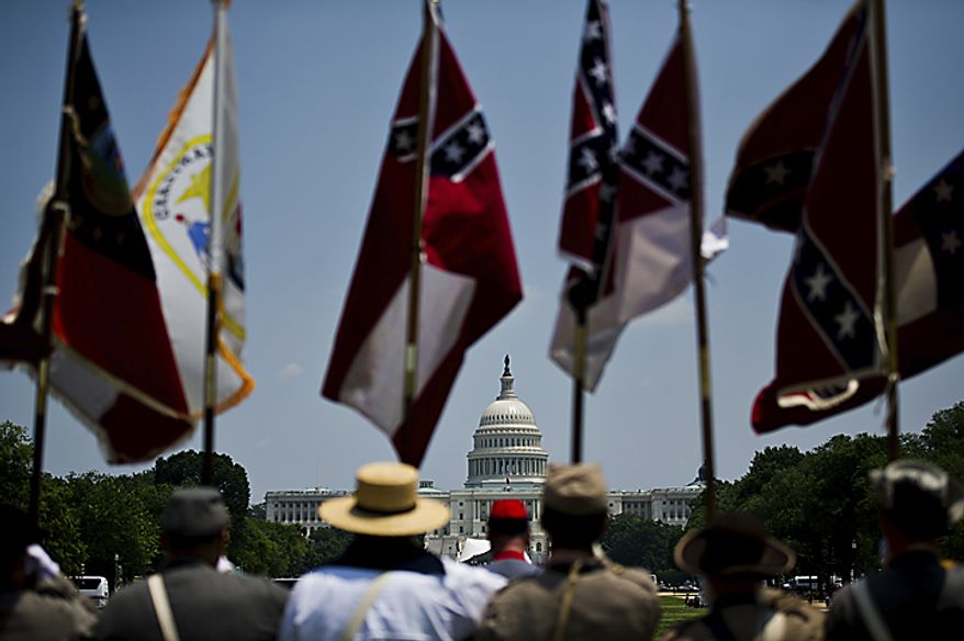 The Maryland Division of the Sons of Confederate Veterans prepare for the start of the National Memorial Day Parade, on the National Mall in Washington, D.C., Monday, May 30, 2011. The only qualification for membership into the group is you must be able to trace back to an ancestor that fought in the Confederate Army. (Drew Angerer/The Washington Times)