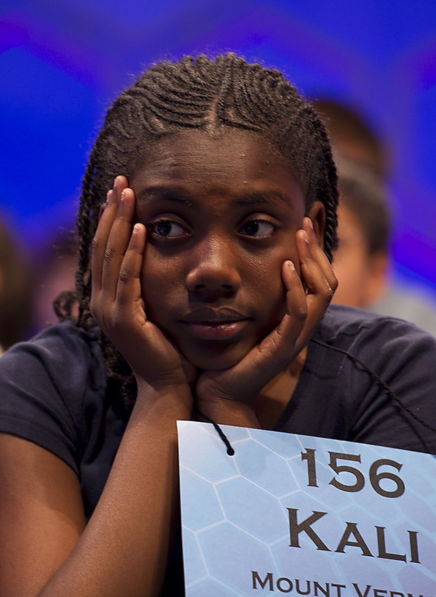 Eleven-year-old Kali Palmer of Mount Vernon, N.Y., looks bored waiting for the other spellers in Round Two of the Scripps Howard National Spelling Bee to get through their words on Wednesday, June 1, 2011. Two hundred and seventy-five spellers from around the country competed in the 2011 bee, which was held at the Gaylord National in Oxon Hill, Md. Spellers were not eliminated during Wednesday's rounds, but rather earned points towards competing in the semifinals, which will be held tomorrow. (Barbara L. Salisbury/The Washington Times)