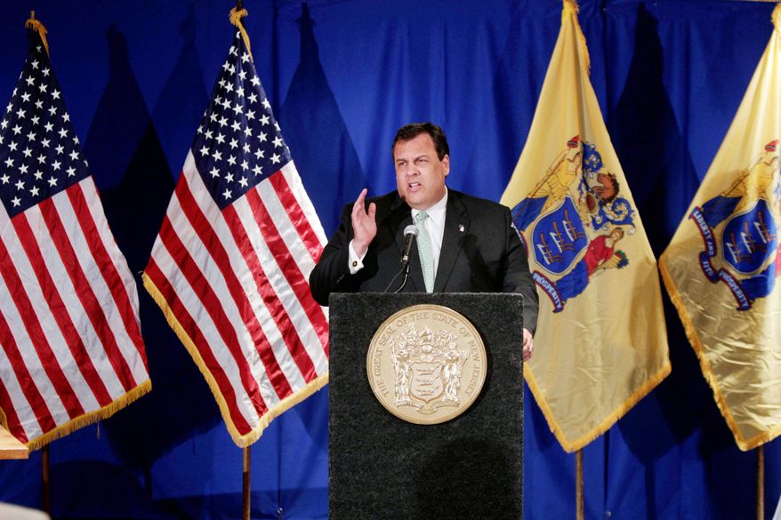 New Jersey Gov. Chris Christie answers a question Thursday in Denville, N.J., as he defends using a state police helicopter for two personal trips, to fly to his son's baseball games and a political event. He said he and the state GOP committee will reimburse the state, a day after a spokesman said he would not make the reimbursement. (Associated Press)