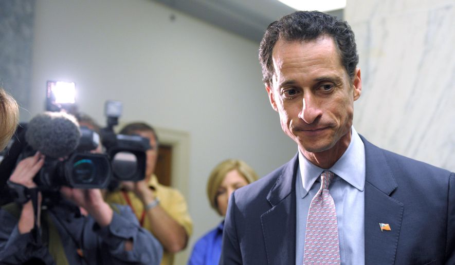 Cameras roll Thursday as Rep. Anthony D. Weiner waits for an elevator on Capitol Hill. Democrats are mum about the lewd photo sent to a coed on his Twitter account, but privately they&#39;re fuming over the distraction from political debate. (Associated Press)