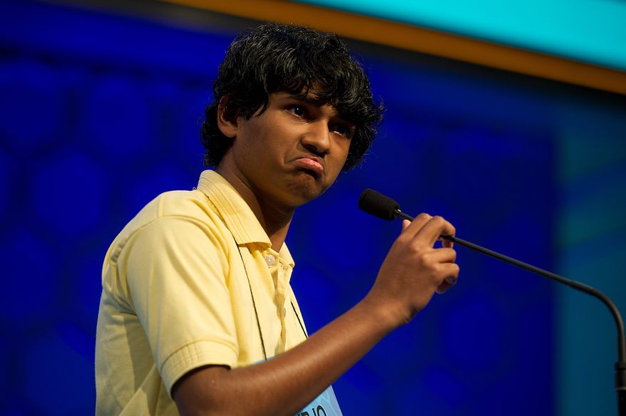 Barbara L. Salisbury/The Washington Times
Surjo Bandyopadhyay, 14, of Lusby, Md., grimaces when given the word "nachschlag" to spell in the semifinals of the 2011 Scripps National Spelling Bee on Thursday. He misspelled what he jokingly called a "strange word."