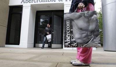 In this photo from May 17, 2011, customers leave an Abercrombie &amp; Fitch store in Palo Alto, Calif. (Associated Press)