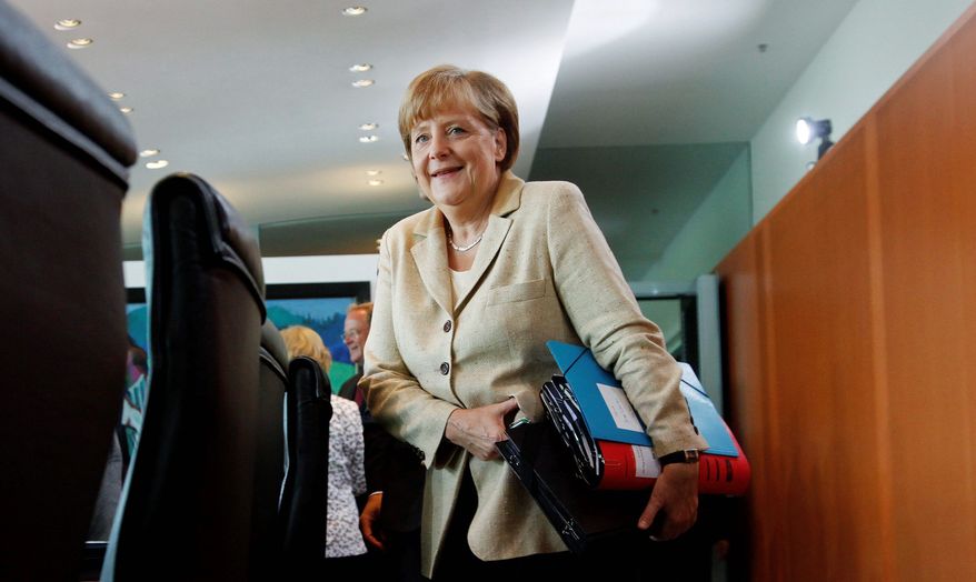 German Chancellor Angela Merkel is to visit the U.S. starting on Tuesday and be presented the Presidential Medal of Freedom. (Associated Press)