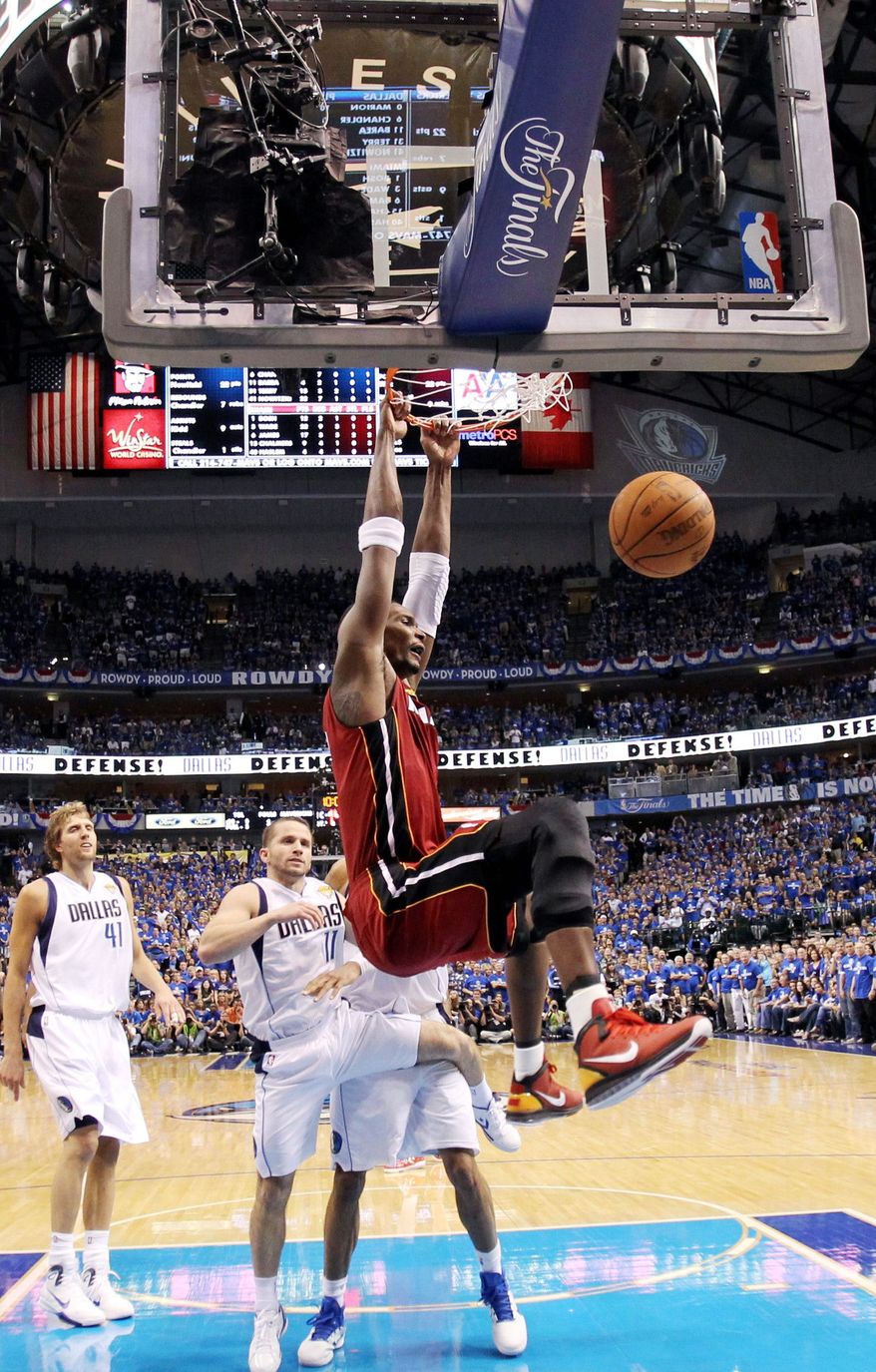 ASSOCIATED PRESS
Miami's Chris Bosh said he couldn't let getting poked in the eye bother him during the Heat's Game 3 victory.
