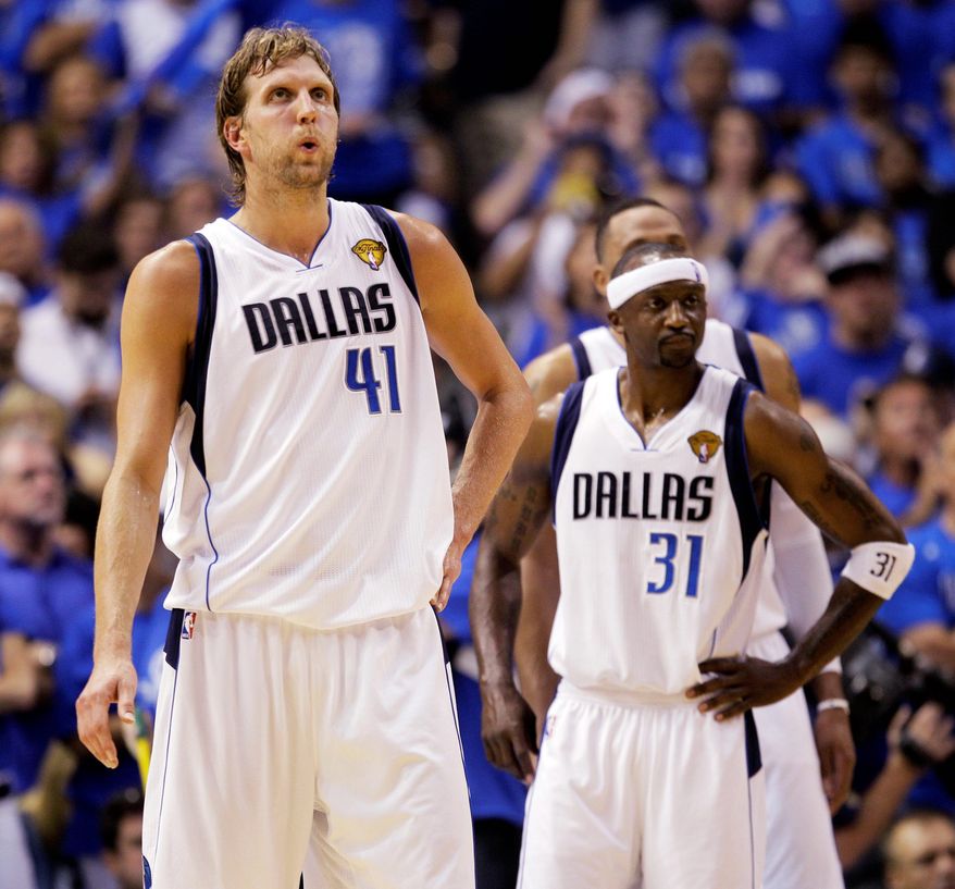 ASSOCIATED PRESS
Dirk Nowitzki (41) is averaging 28.3 points for Dallas through Game 3 of the finals, but offense has been hard to come by for Jason Terry (31) and the rest of the Mavericks.