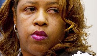 ROD LAMKEY JR./THE WASHINGTON TIMES
UNDER OATH: Cherita Whiting testifies at an oversight hearing before the Government Operations Committee on Monday.