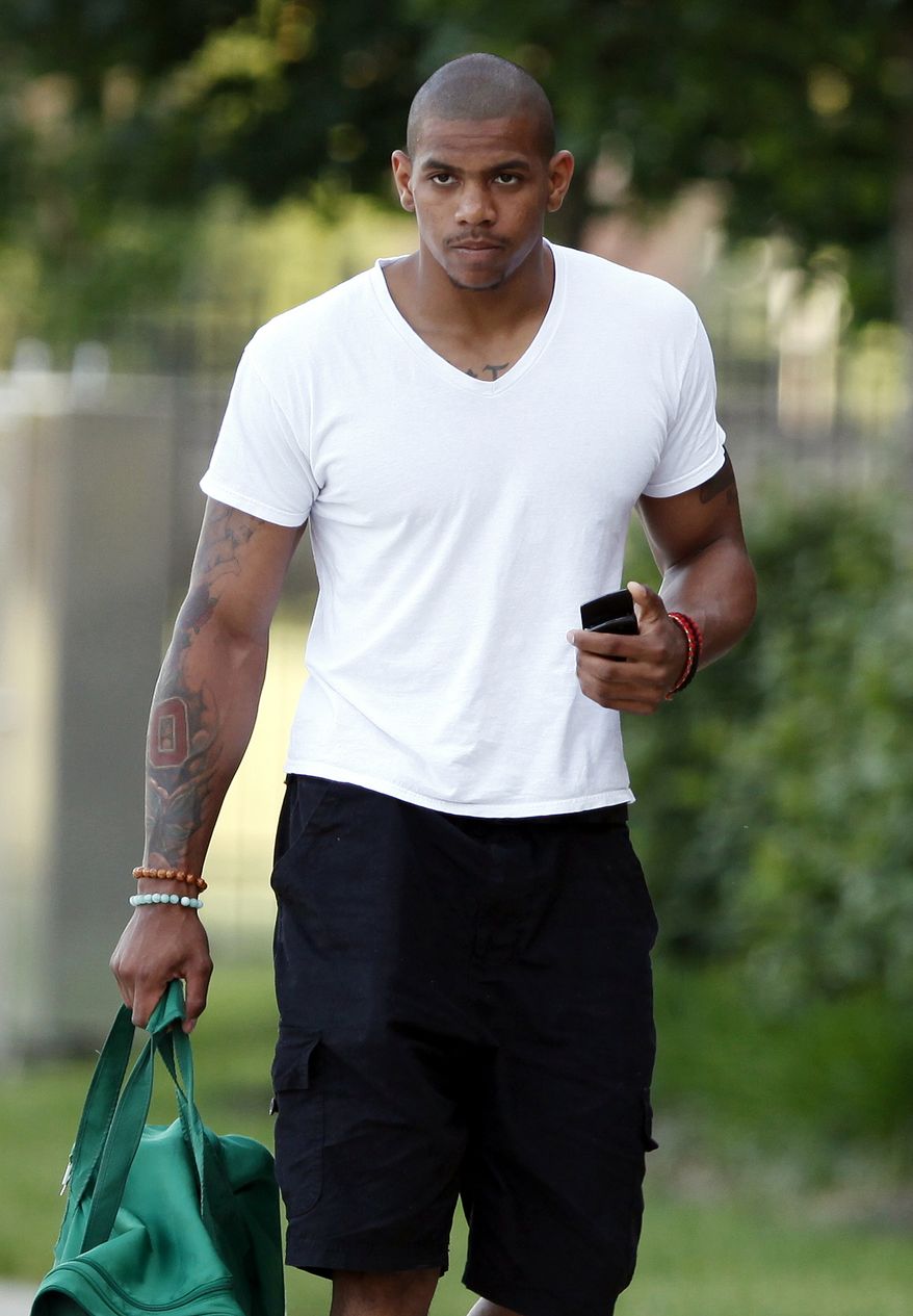 Ohio State's former quarterback Terrelle Pryor is one of five Buckeyes who have been suspended for the first five games of the 2011 season for taking money and tattoos from a local tattoo-parlor owner. Pryor has decided he won't return to Ohio St. for his season year. (AP Photo/Terry Gilliam)