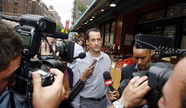 Rep. Anthony Weiner, New York Democrat, is questioned by the media near his home in the Queens borough, Saturday, June 11, 2011. The 46-year-old congressman acknowledged Friday that he had online contact with a 17-year-old girl from Delaware but said there was nothing inappropriate. (AP Photo/David Karp)
