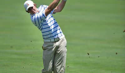 Peter Uihlein, an Oklahoma State University senior and the reigning U.S. Amateur champion, hits an approach shot during the first day of practice rounds at Congressional Country Club.