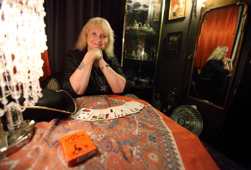 The historic seaport of Salem, Mass., trying to rebrand itself for visitors, forever will be tied to witches and the infamous 17th-century witch trials with draws such as tarot card reader Willow Houston (above) and witch tchotchkes of all shapes and sizes.